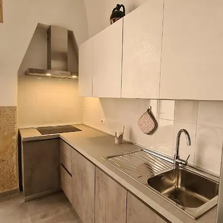 Апартаменты La Giara House *